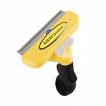 Brosse anti-poils pour chien jaune avec lame en acier inoxydable et bouton pour enlever facilement les poils morts accumulés