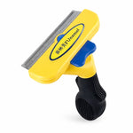 Brosse anti-poils jaune pour chien avec lame en acier inoxydable et bouton d’éjection permettant de retirer facilement les poils accumulés