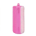 Brosse rectangulaire en silicone rose avec différentes textures de picots souples (blancs et roses) pour le toilettage et le massage des animaux domestiques.