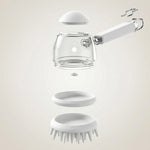Vue éclatée montrant les composants détachables de la brosse de bain pour animaux : couvercle, réservoir transparent, joint d'étanchéité et socle à picots en silicone blanc.