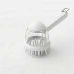 Brosse de lavage pour chien et chat en silicone blanc avec réservoir transparent pour le savon et manche ergonomique, vue sur fond blanc.