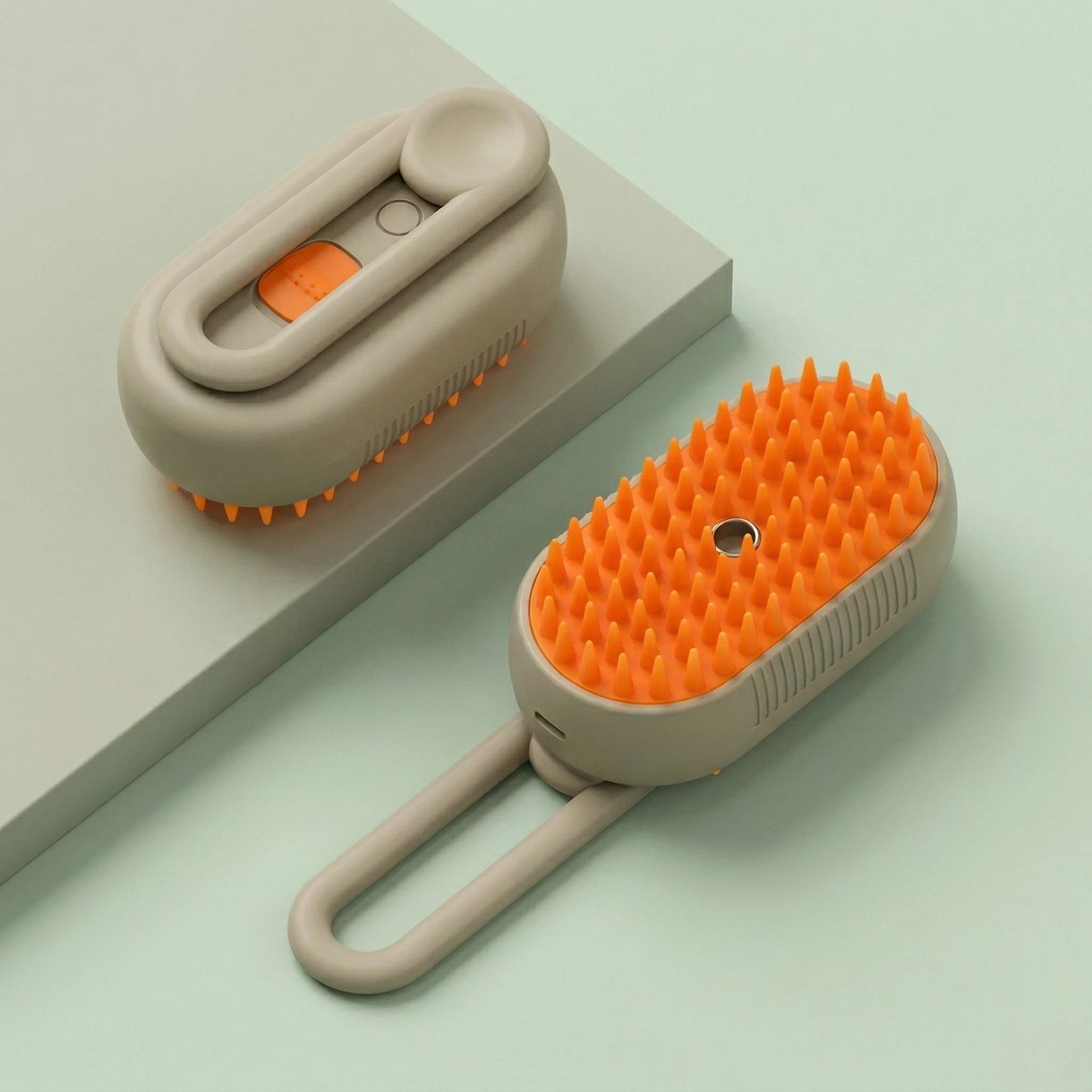 Brosse vapeur pour chien et chat avec picots souples et poignée pliable pour retirer les poils morts et faciliter le toilettage