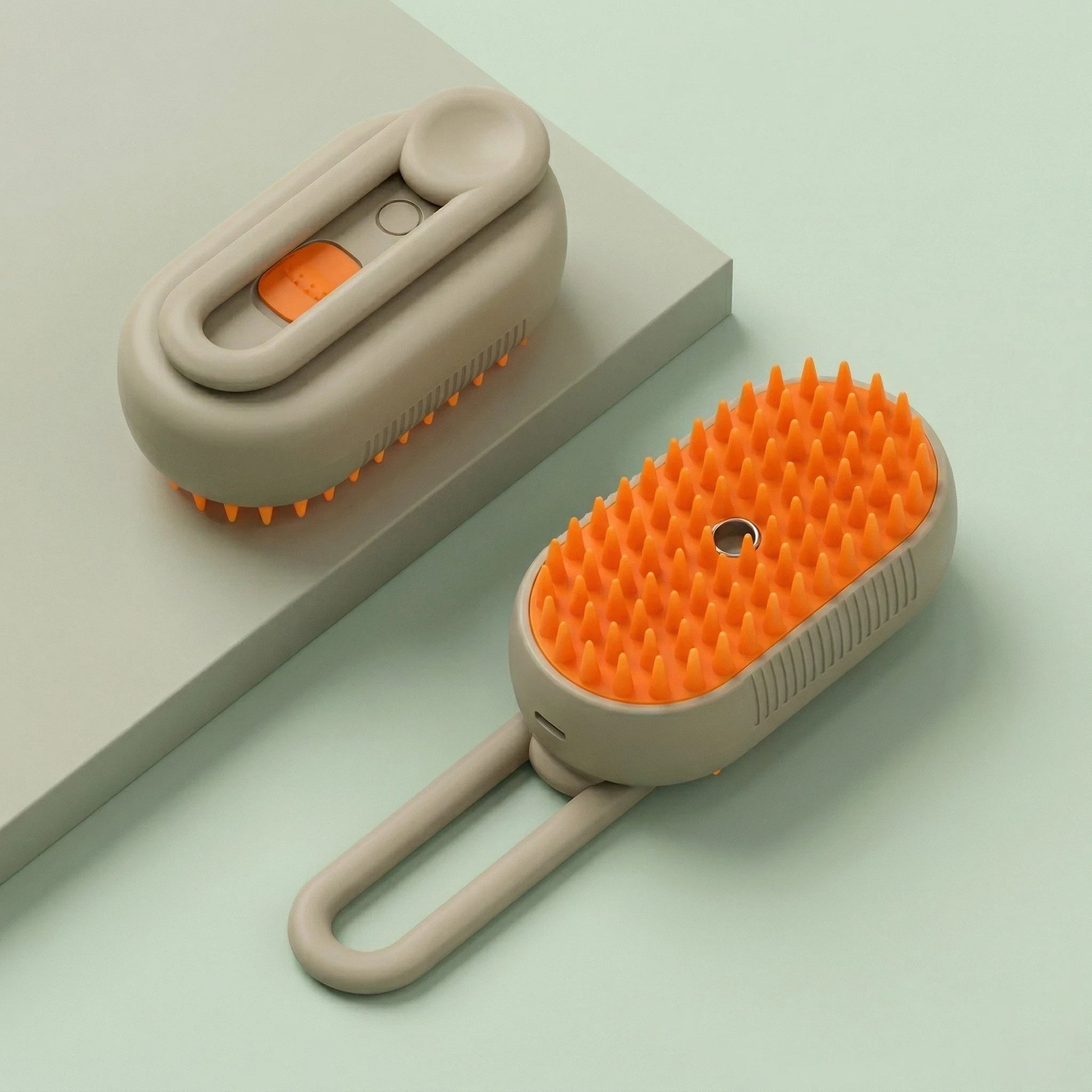 Brosse vapeur pour chien et chat avec picots souples et poignée pliable pour retirer les poils morts et faciliter le toilettage