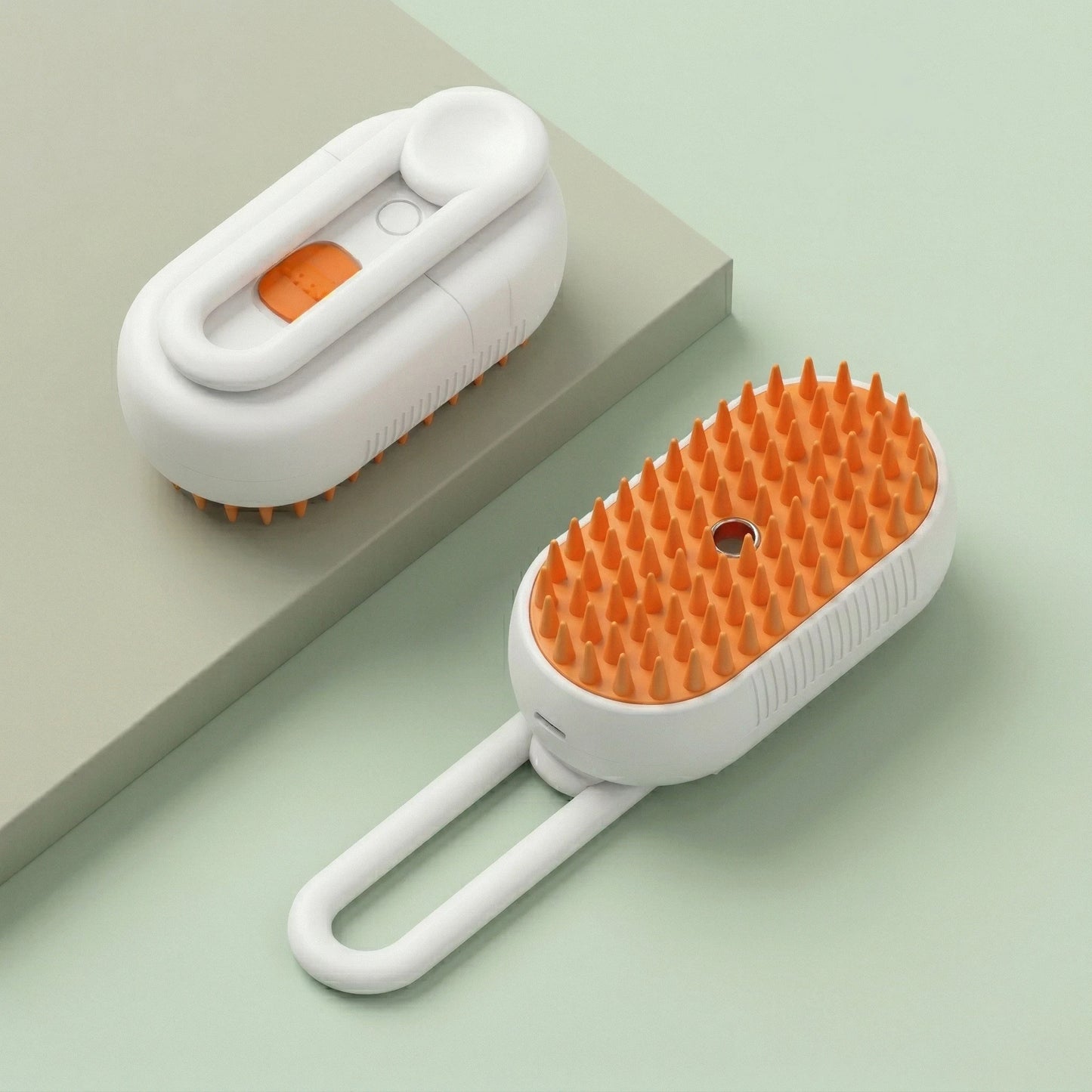 Brosse vapeur pour animaux avec picots souples, idéale pour enlever les poils morts et toiletter chien et chat facilement