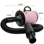 Schéma technique du séchoir pulseur rose pour animaux montrant les dimensions compactes : longueur de 33cm, hauteur de 20cm et diamètre de sortie de 17cm, avec tuyau noir flexible, fond blanc.