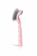 Brosse démêlante courbée rose vue de profil pour chien et chat avec picots métalliques pour enlever les nœuds et retirer les poils morts efficacement