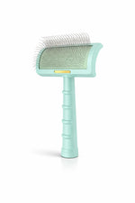 Brosse démêlante courbée verte pour chien et chat avec picots fins pour enlever les nœuds et retirer les poils morts sans tirer
